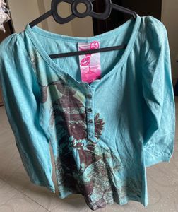 Remanika Blue Graphic T-Shirt – Size XS (with tag)