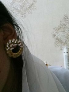 combo of golden jhumri and Studs earring