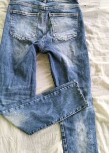 Distressed Denim Jeans