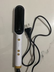 Straightening comb with temp control