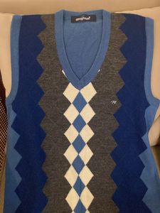 Two Sleeveless Sweaters