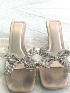 Bow Glass Heels