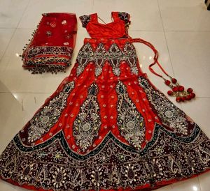 Red Wedding lehanga with stud work on Dupatta