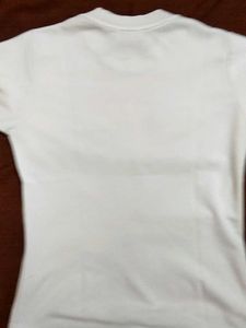 A White coloured T-shirt
