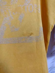 Stylish Yellow Embellished Top