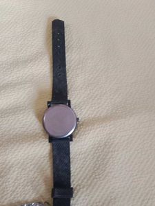 chain and Balck watch, golden colour watch