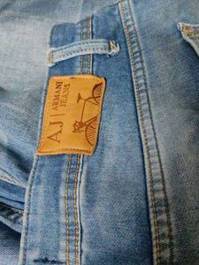 Distressed Blue Denim Jeans