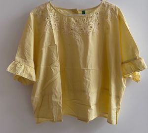 UCB Yellow Solid Styled Back Pure Top