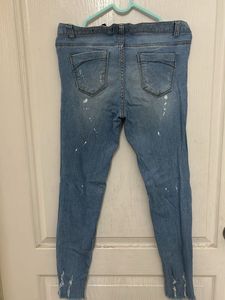 Ripped Knee Jeans