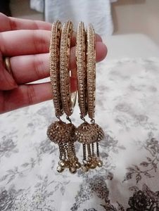Golden Bangles with Dangling Charms