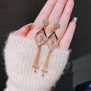 Dangling Diamond Earrings