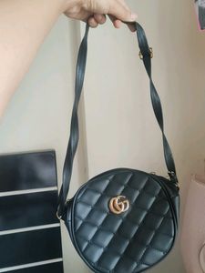 Quilted Circle Sling Bag