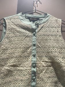 Green Sleeveless Top With Designer Neck
