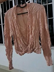wrap style light pink blouse