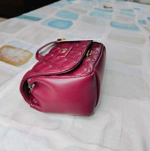 INC.5 Women Wine Quilted Sling Bag