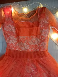 Orange color embroider gown for Women