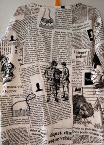Viral Newspaper Print Pullover Top