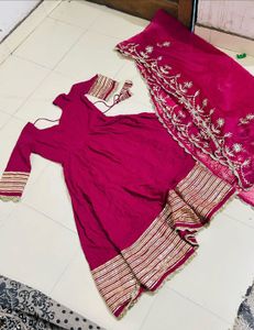 Magentta  anarkalli suit.