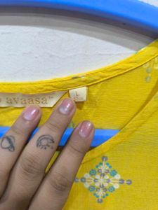 Yellow A-line Kurti.