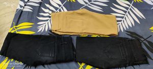Special offer of Combo of 2 jeans: 1 black denim,waist-32 and 1 beige trouser,waist 30
