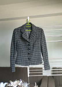 Black striped long sleeve blazer.