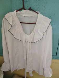 Ruffle Trim Tie Neck Blouse