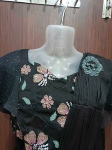 Elegant Black Saree with Floral Details And Belt