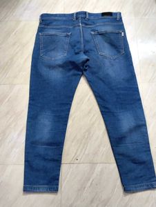 Distressed Denim Jeans with Patches