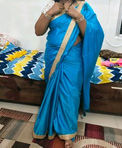 Light Firozi Saree With Golden Border