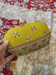 Oval Embroidery Stones Hand Clutch With Sling