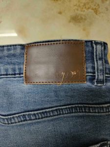 Distressed Denim Jeans