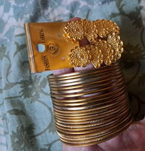 Plain Golden Bangles And Earrings
