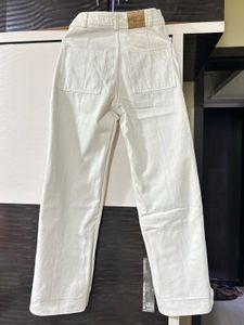 White flared jeans