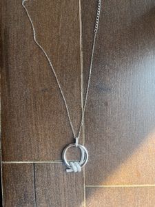 Elegant Silver Knot Pendant/new