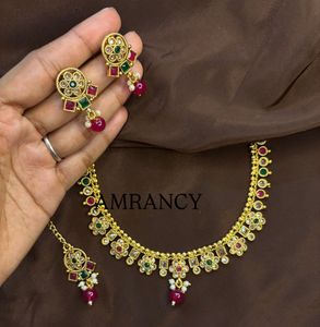Golden Jewellery Set With Tikka