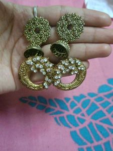 combo of golden jhumri and Studs earring