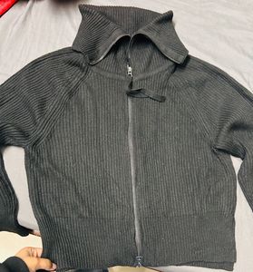 Black Knit Zip-Up Jacket with a high collar. (M/L)