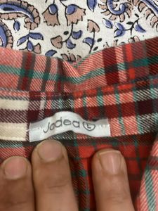 A Casual Shirt With Checks