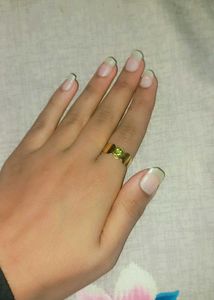 Gold Ring with Green Gemstone