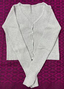 grey long sleeve buttoned top
