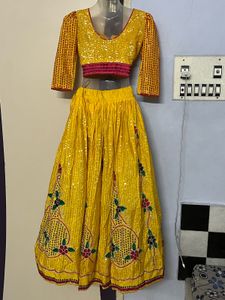 Full Work Embodiment Yellow Lehenga Choli