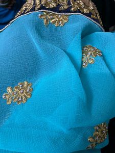 cyan color embroidery work saree
