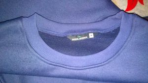 this is a nevy blue sweatshirt from highlander