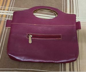 Maroon Handbag with Floral Detail