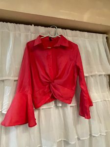 Sfront knot cropped pink with bell sleeves shirt