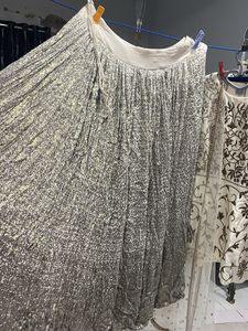 cream full hand work Chaniya choli wid net dupatta