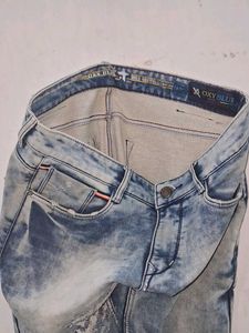 Distressed Denim Jeans