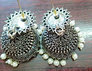 A Beautiful Oxidised White Moti Jumki Earings