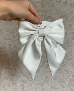 White Bow Hair Accessory