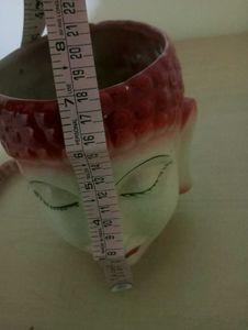 Buddha Face Ceramic Vase